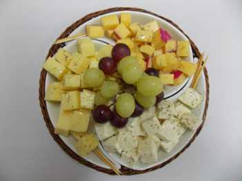 Porção de queijos